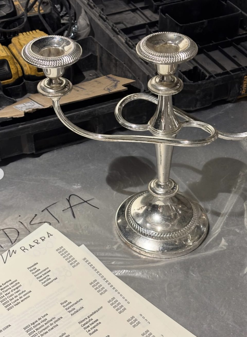 Silver candelabra and the Barra Oso wine list